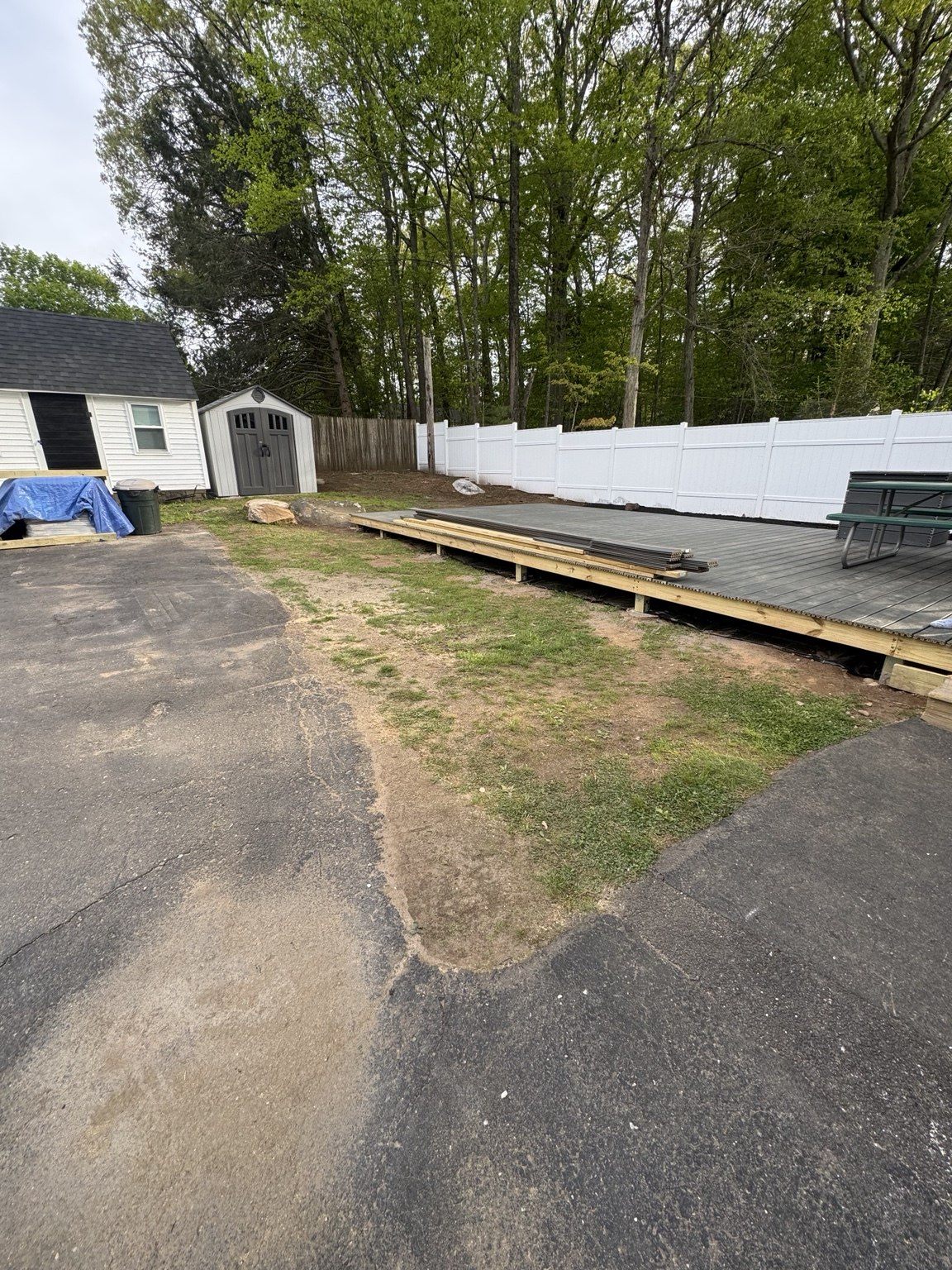 Bare ground beside the deck